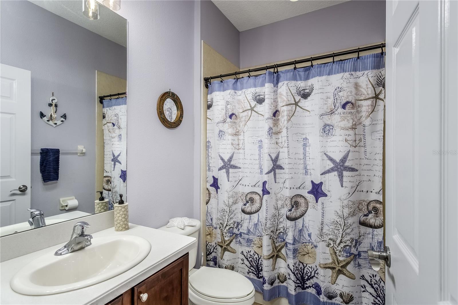 Guest bathroom with tub
