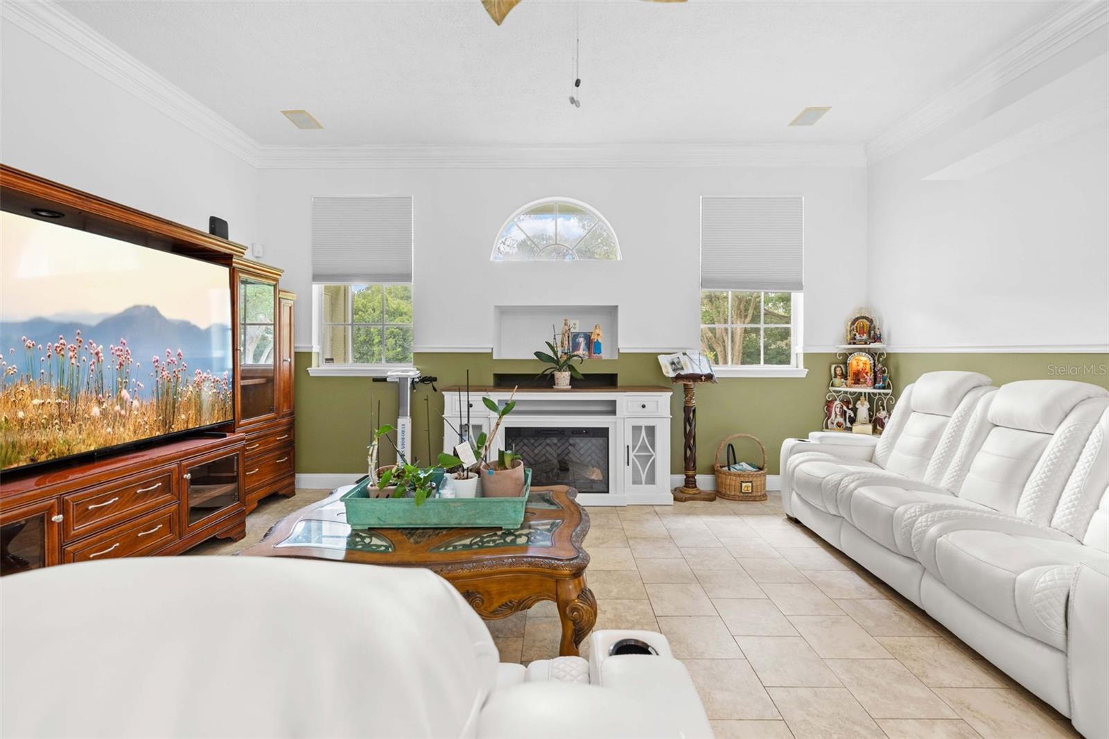 Family Room. recessed cabinets and shelving