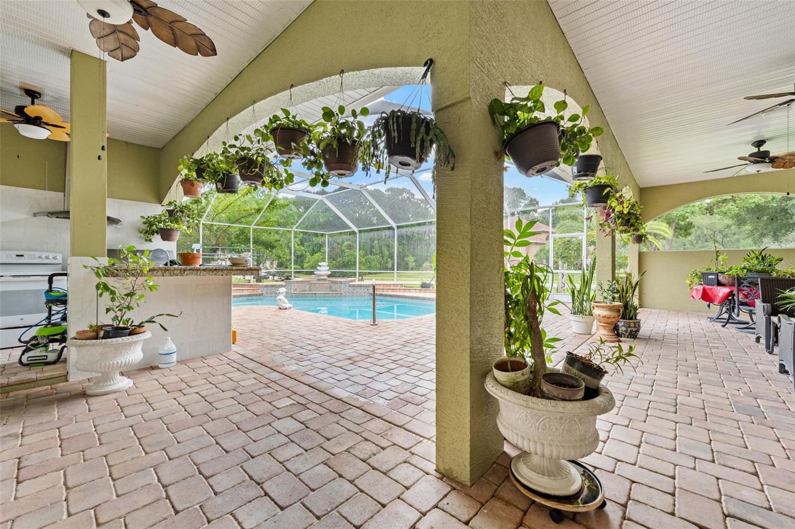 serene timeless brick paver pool terrace