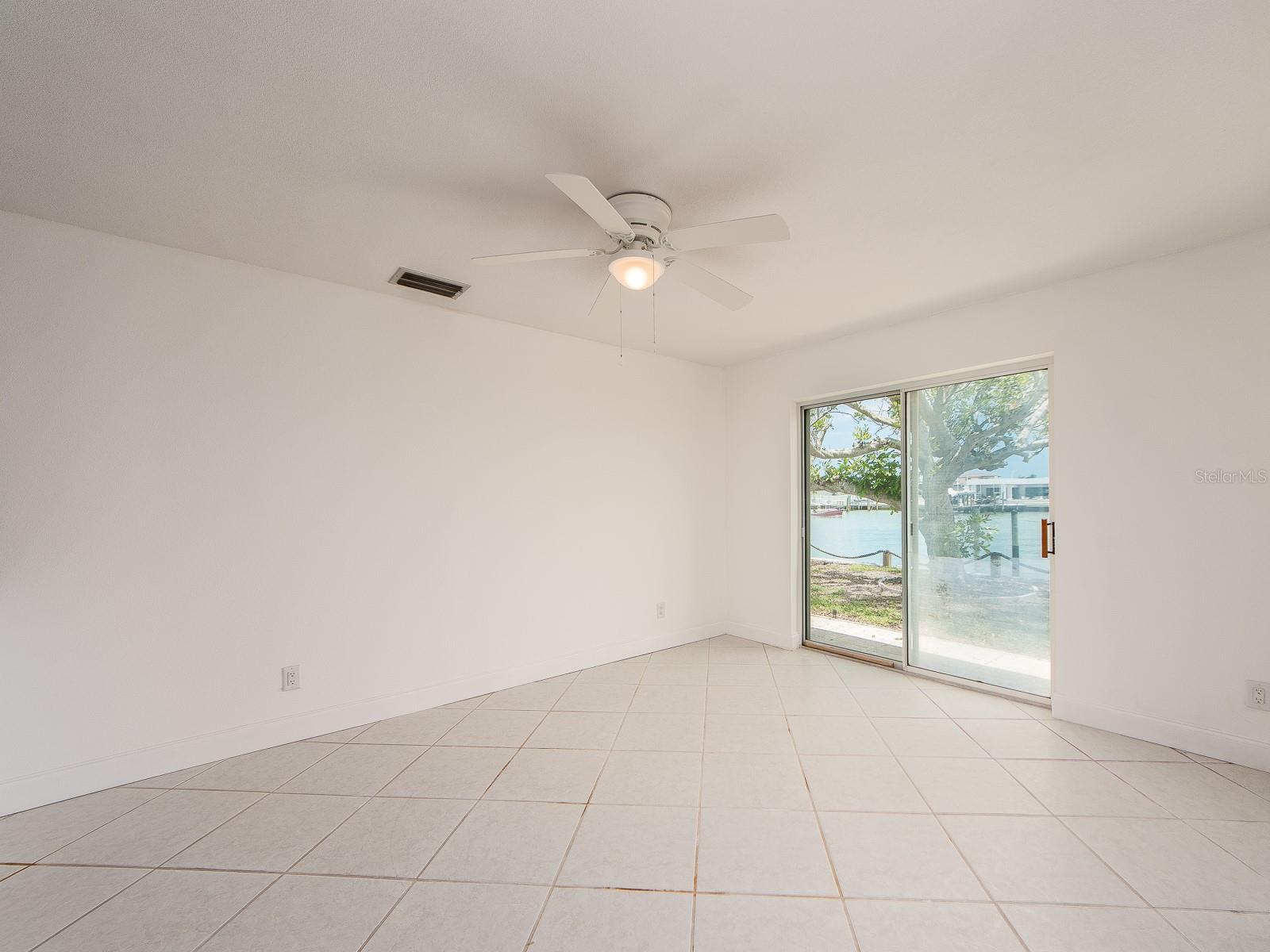 dining area leading to sliding patio doors