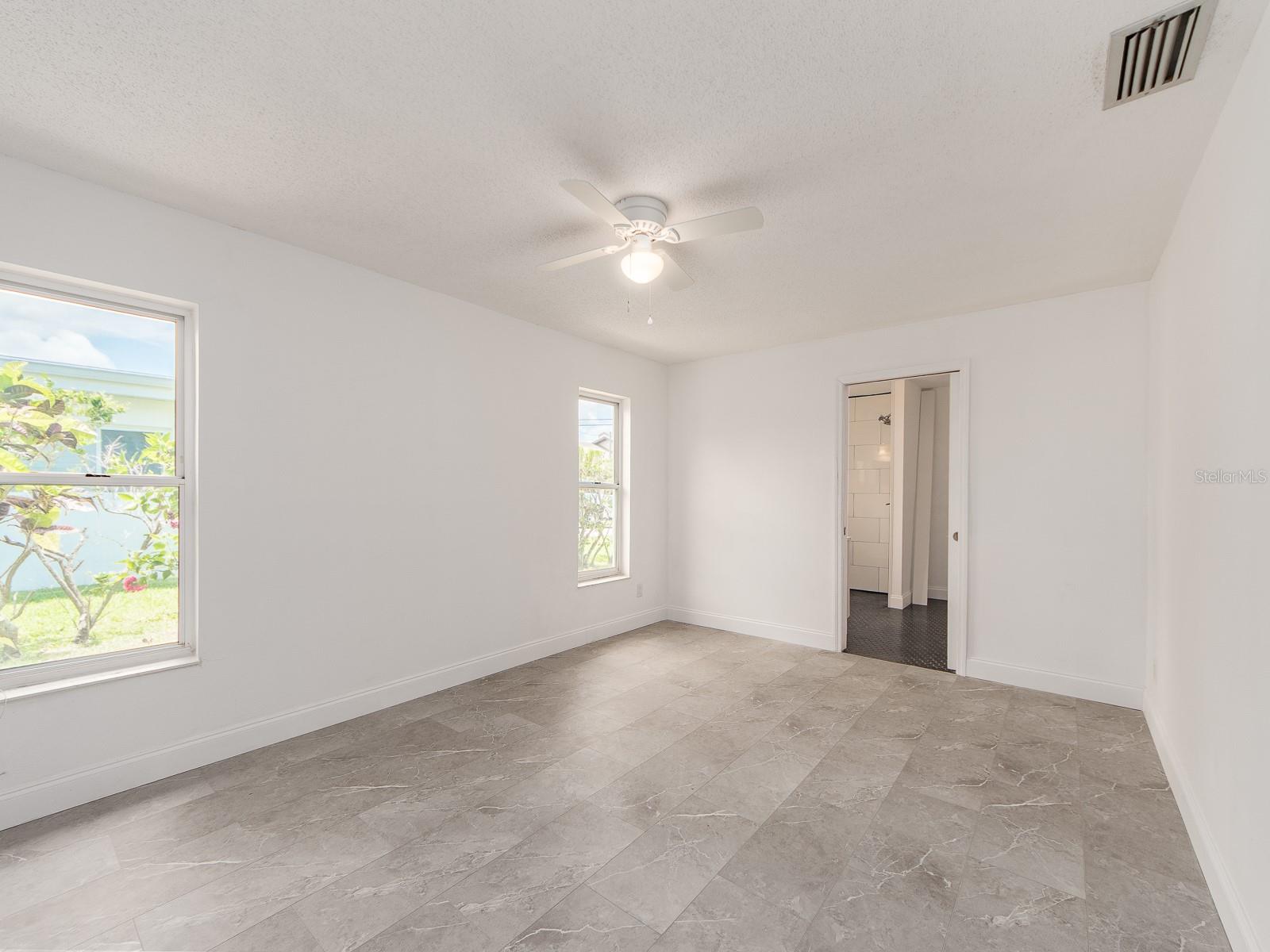 Primary bedroom off kitchen/ living area. With private ensuite