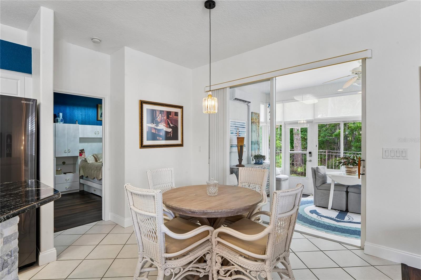 DELIGHTFUL BREAKFAST NOOK ADJACENT TO KITCHEN AND FLORIDA ROOM