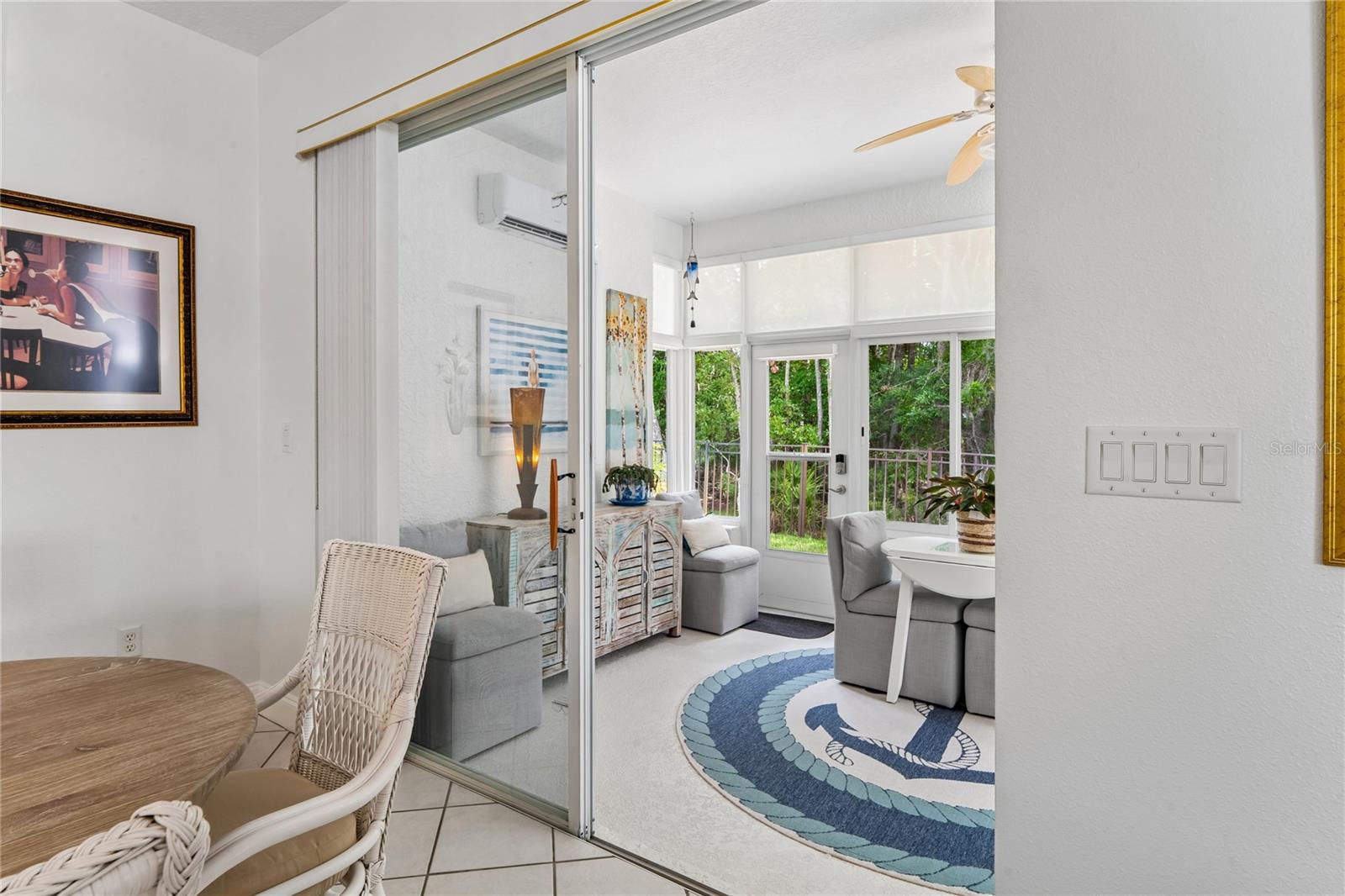 ADDITIONAL HEATED-AIR CONDITIONED FLORIDA ROOM BRINGS THE OUTDOORS INSIDE.  ACCESSED DIRECTLY FROM THE BREAKFAST ROOM, IT IS PERFECT FOR YOUR MORNING COFFEE AND PRE-DINNER CLASS OF WINE.