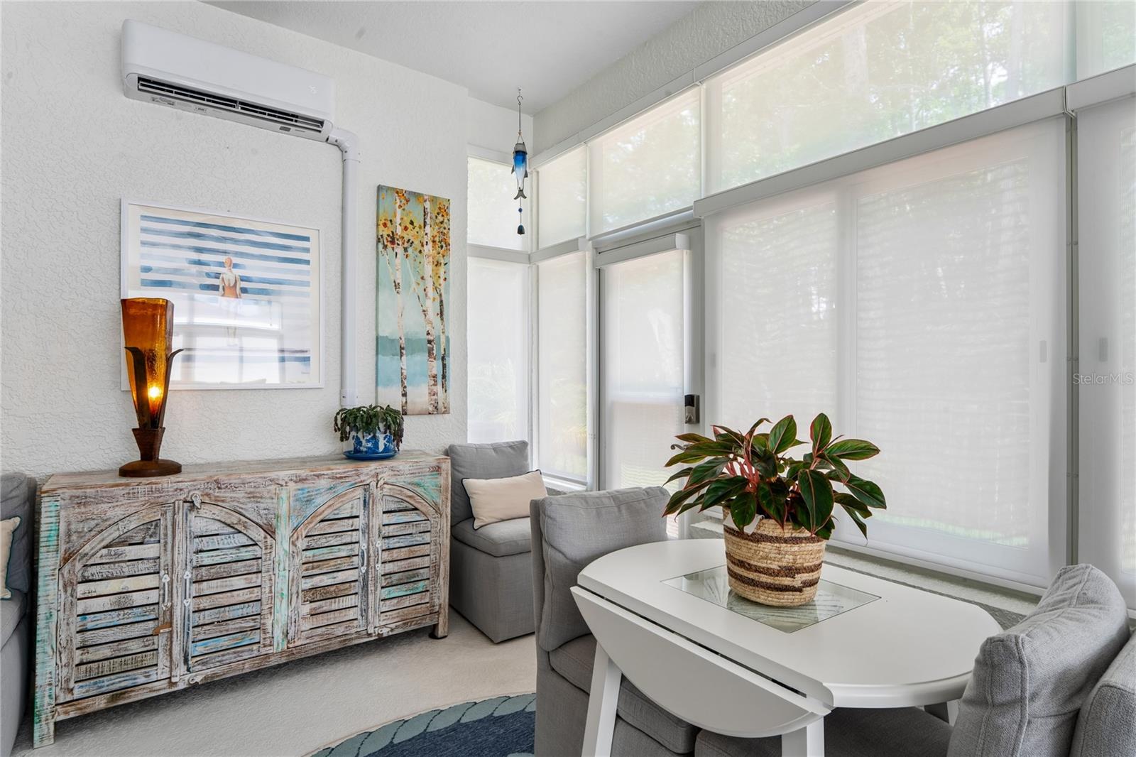 PROFESSIONALLY INSTALLED REMOTE SHADES ON ALL FLORIDA ROOM WINDOWS.