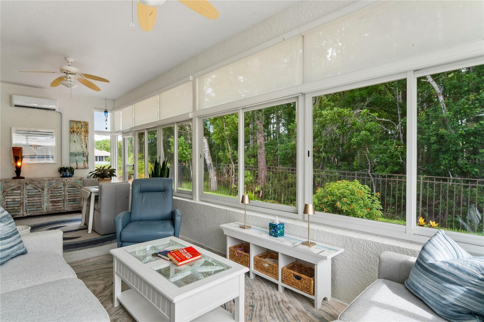 PEACEFUL MORNINGS AND AFTERNOONS.  EASY REMOTE OPERATION OF SHADES ALLOWS ALL WINDOW TREATMENTS TO MOVE AT ONCE OR SINGULARLY.