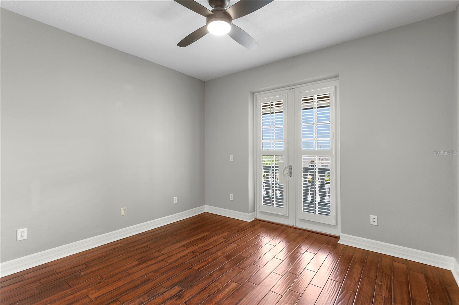 3rd bedroom with balcony view