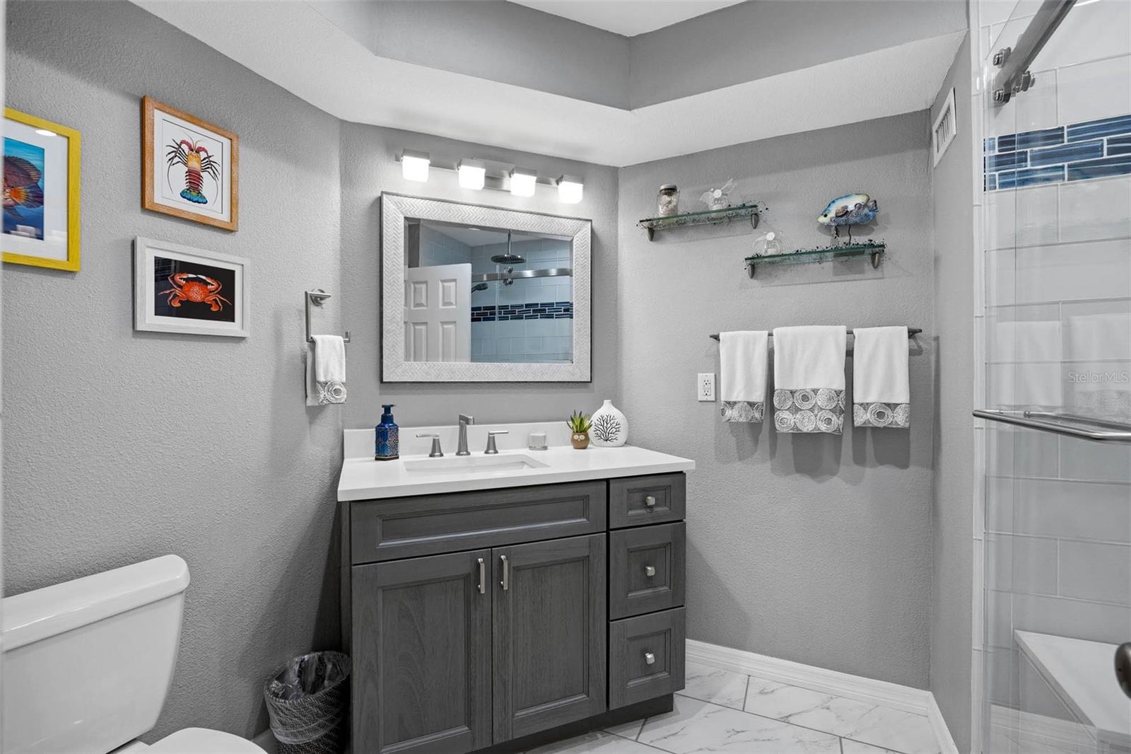 Beautifully updated Full bathroom on main floor for guest use