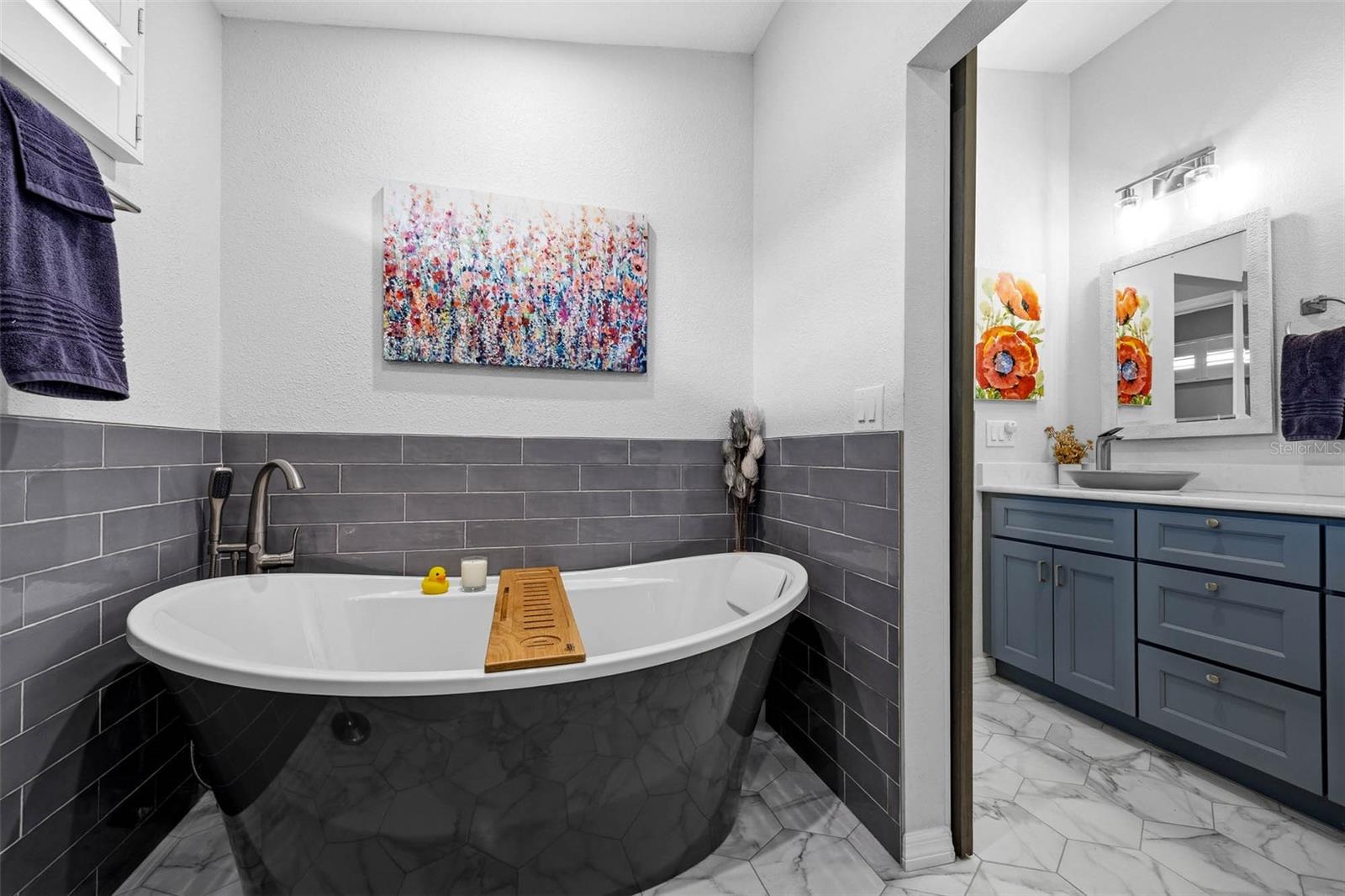 Alternative view of soaker tub in primary bathroom