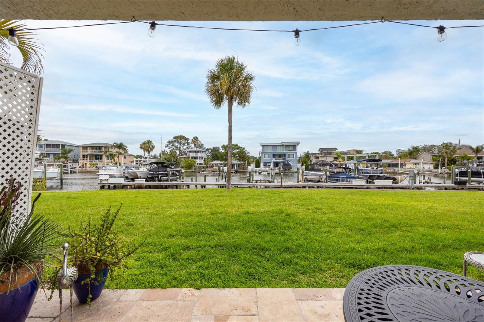 View from the ground floor patio to the creek and docs.