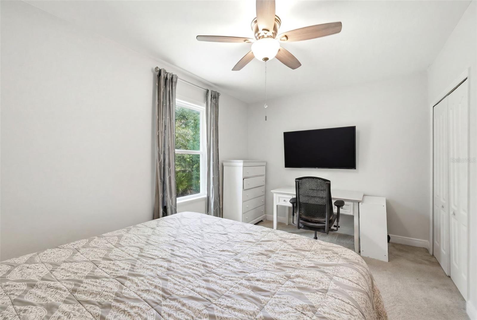 Bedroom two with separate bathroom. Perfect for mother-in-law or guests.