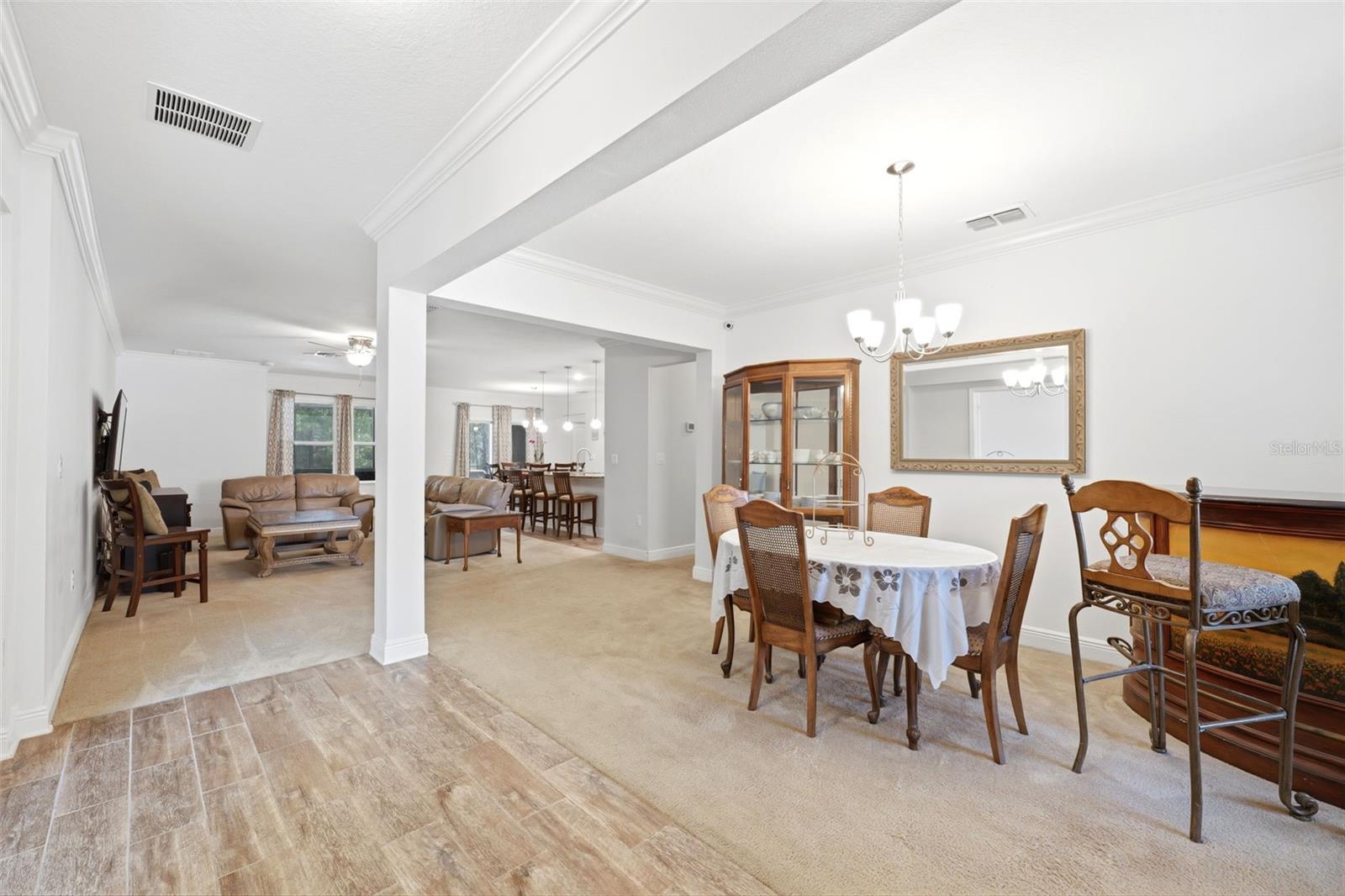 Entryway with separate dining area.