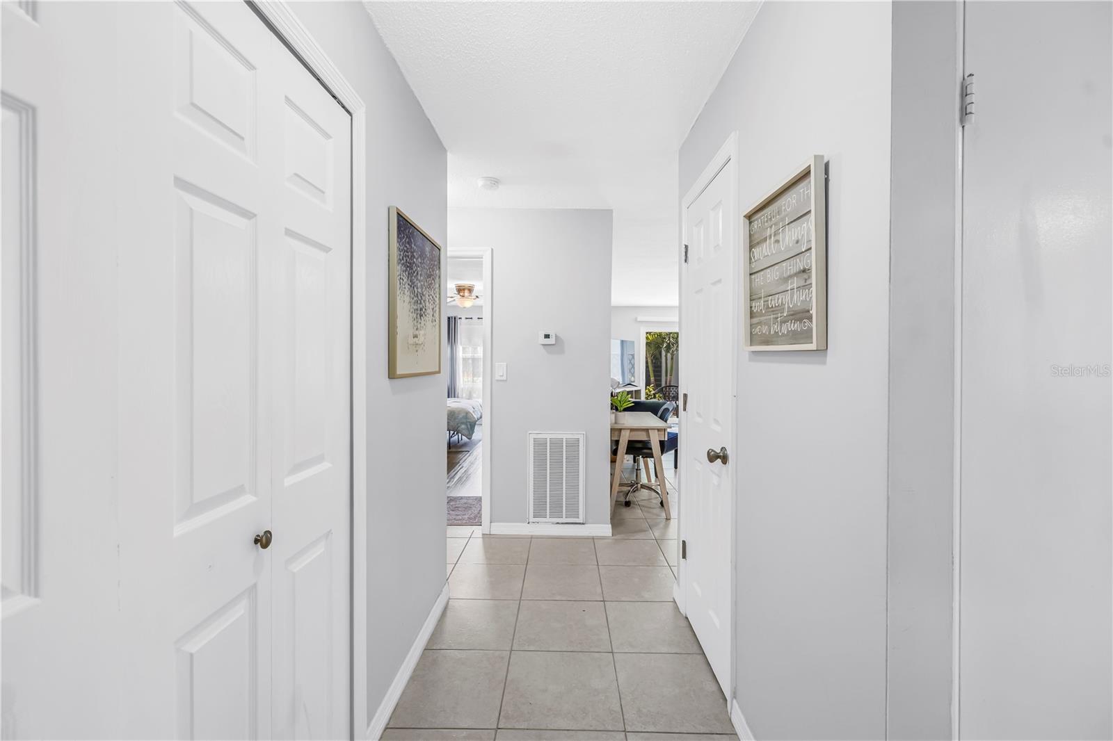Hallway leaving bedroom and bathroom