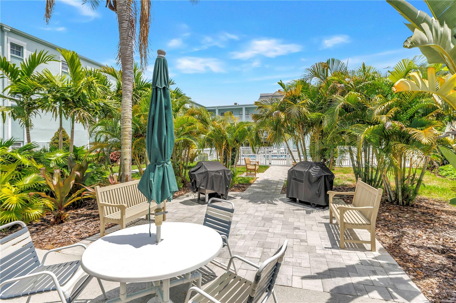 Shared outdoor patio next to pool