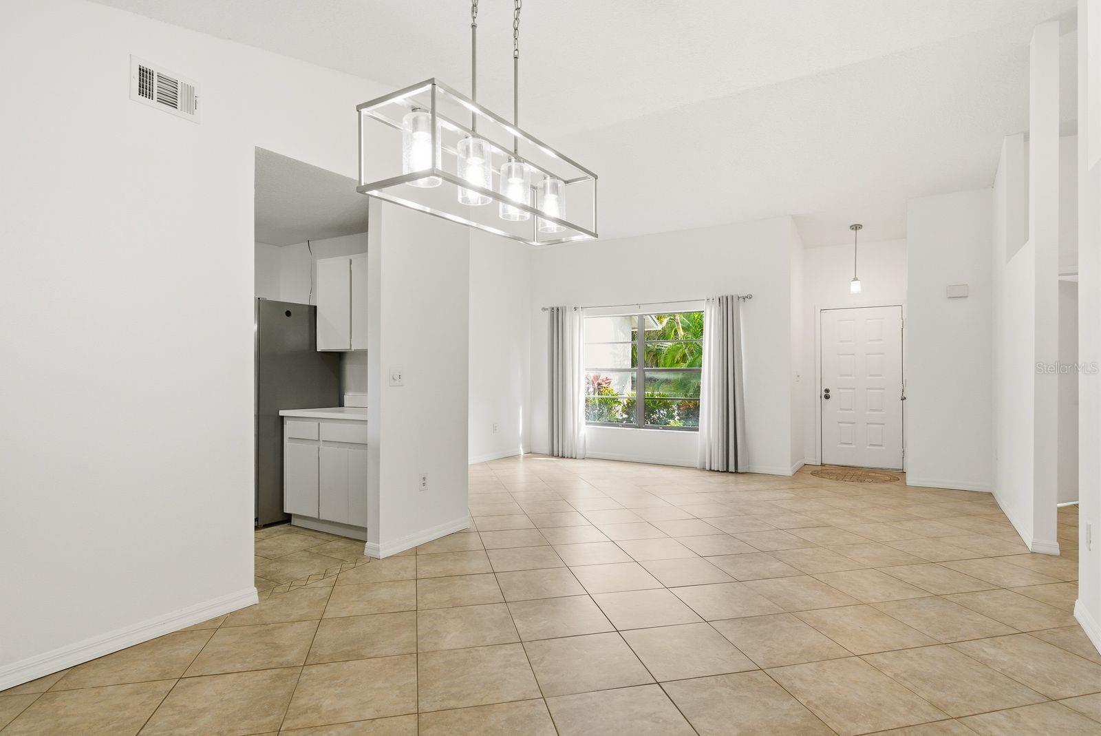 dining with kitchen entry