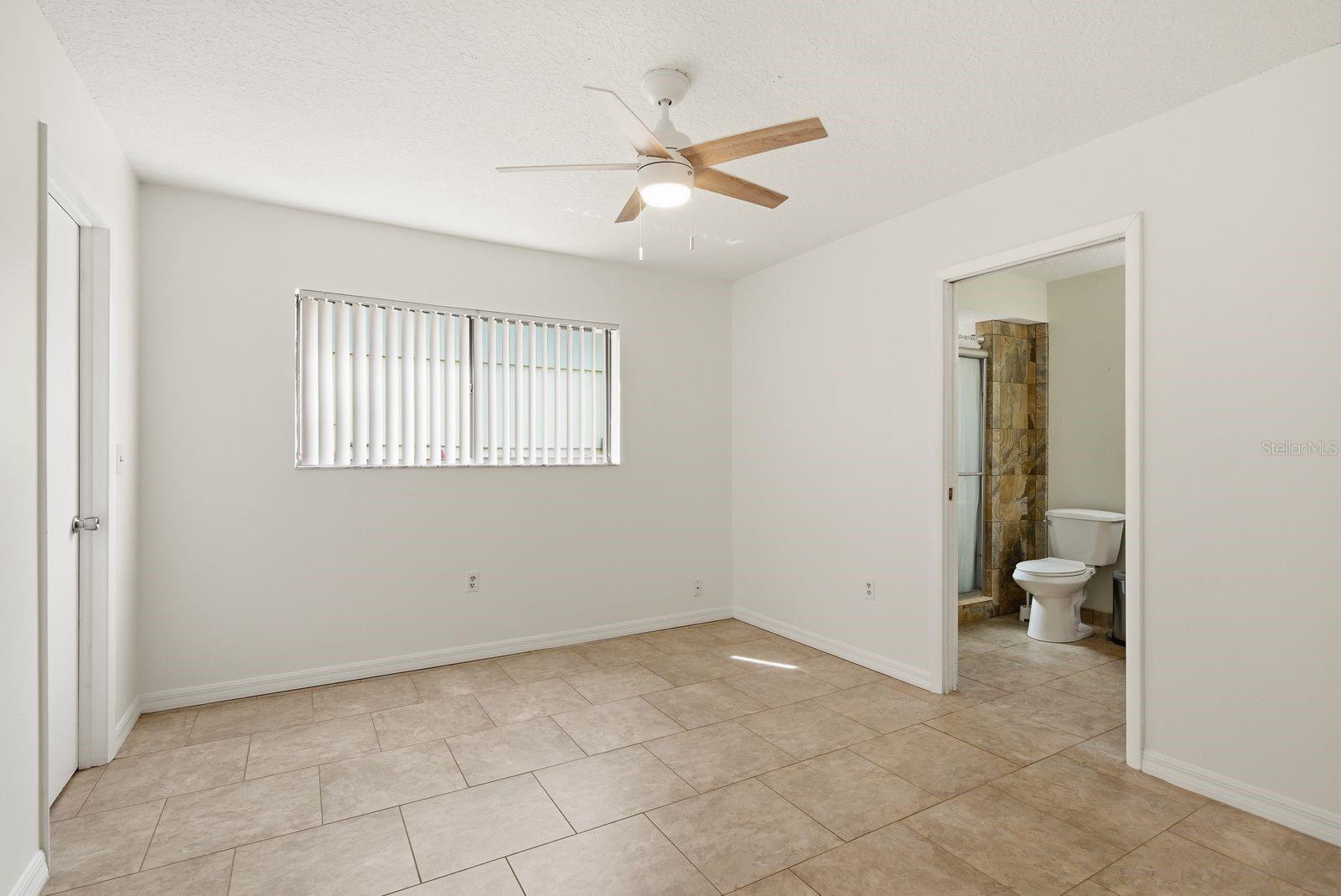 hallway bathroom with access to bedroom 3