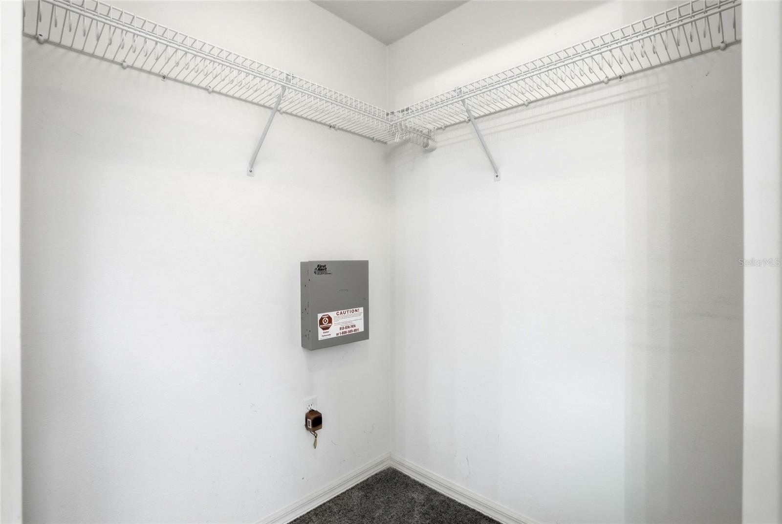 1 of 2 Walk in Closets in Primary Bathroom