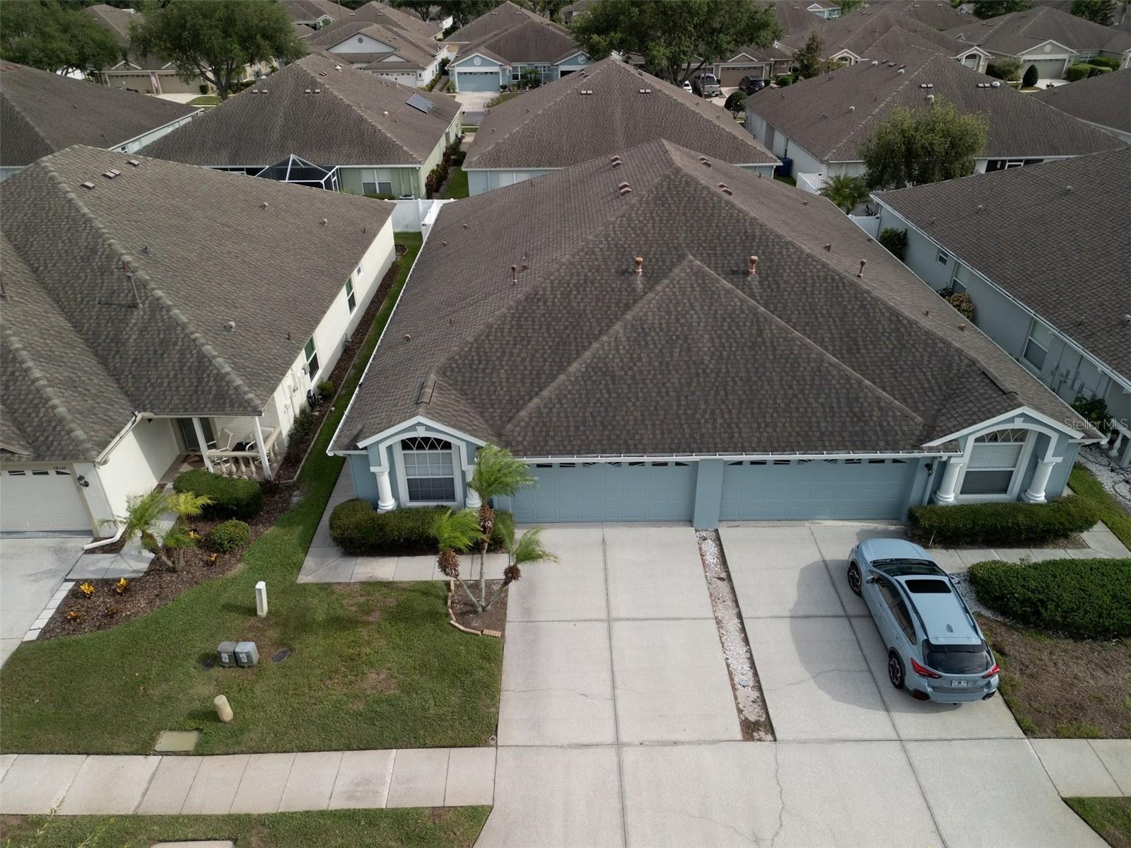 Upper view of the 2 attached villas - the one on the left is this unit.