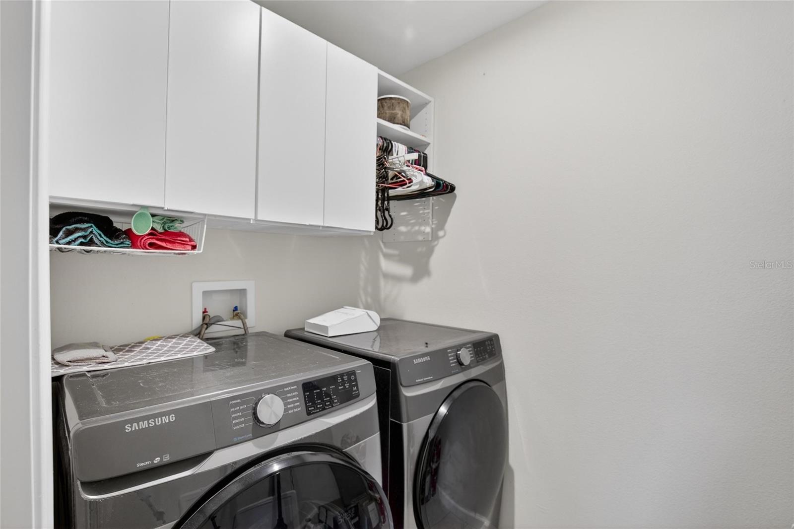 LAUNDRY ROOM WITH CUSTOM CABINETRY