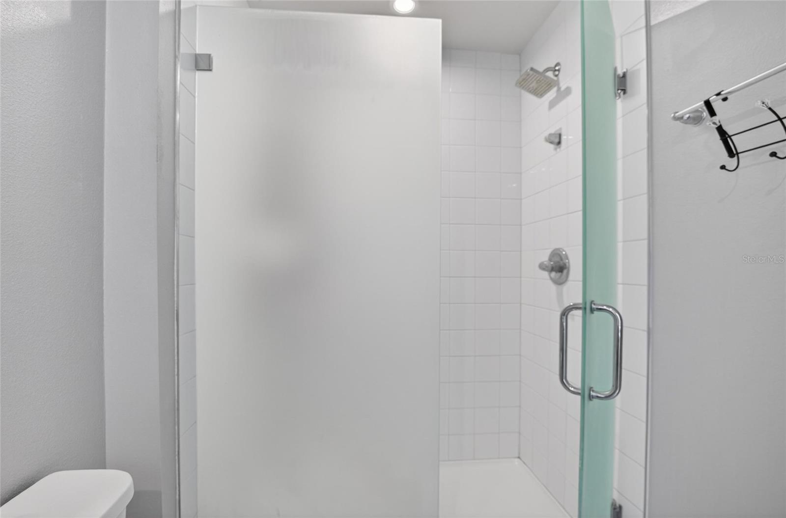 PRIMARY BATH WITH UPGRADED GLASS ENCLOSED SHOWER