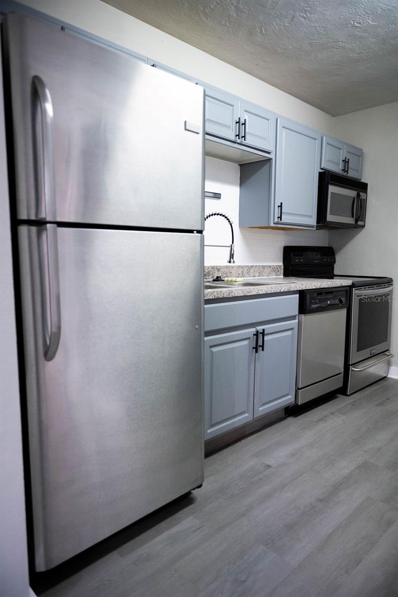 Updated Kitchen with Stainless Steel Appliances