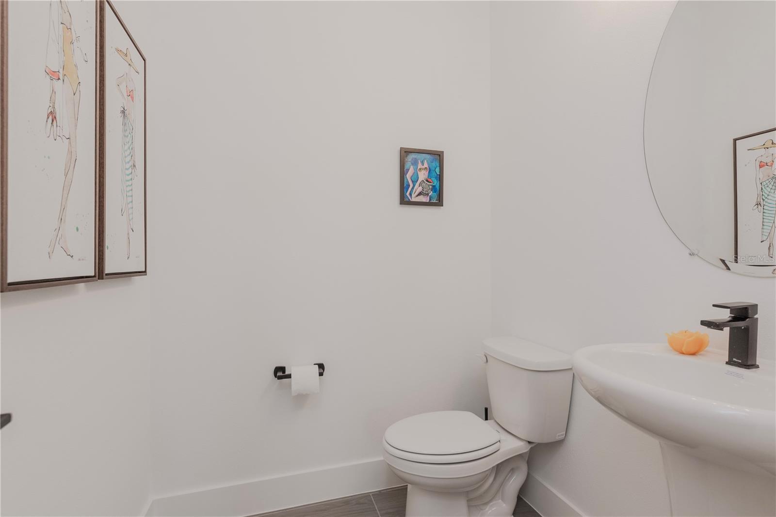 Downstairs half bathroom/powder room.
