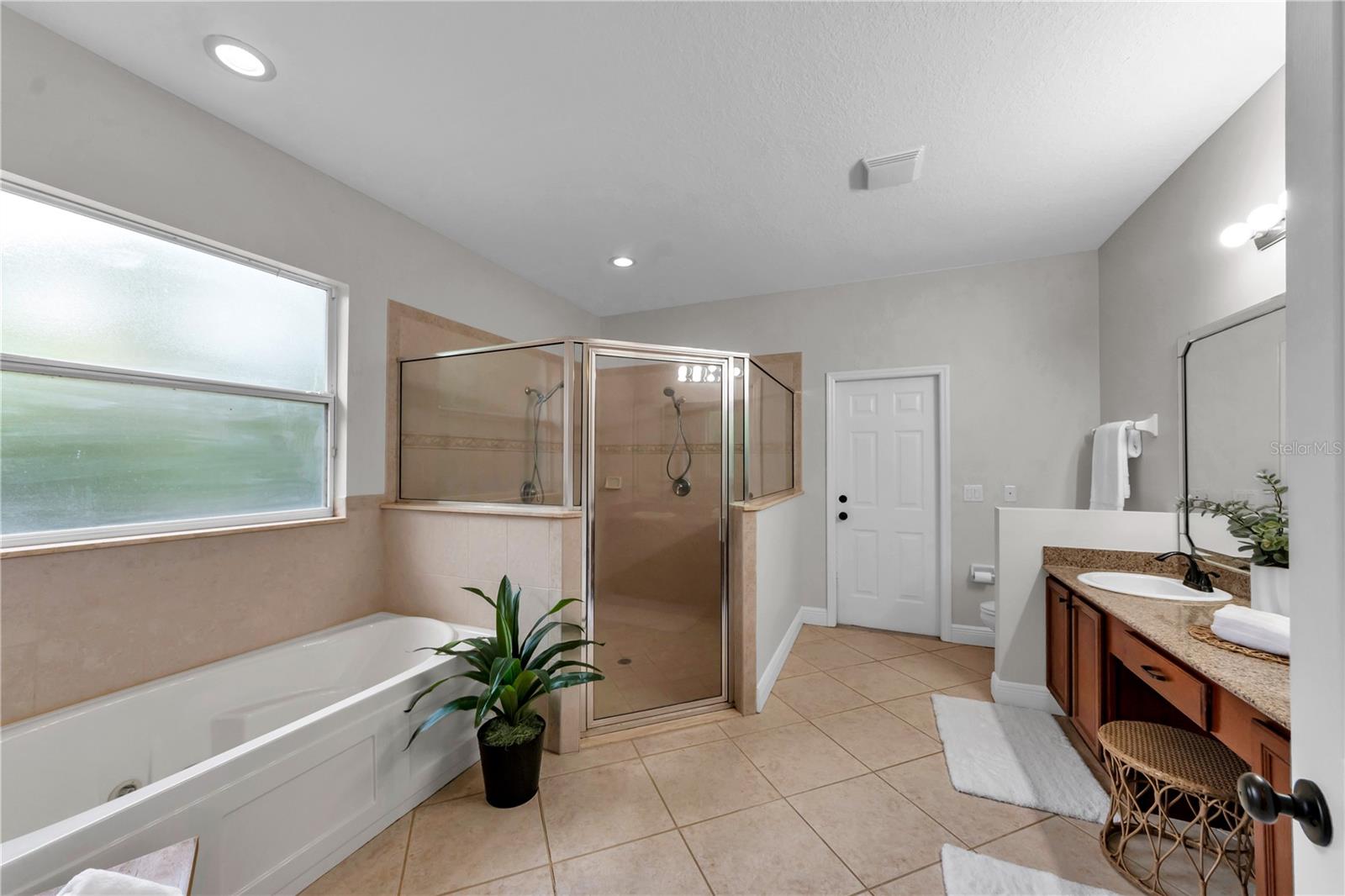 Primary Bathroom with door to screened porch