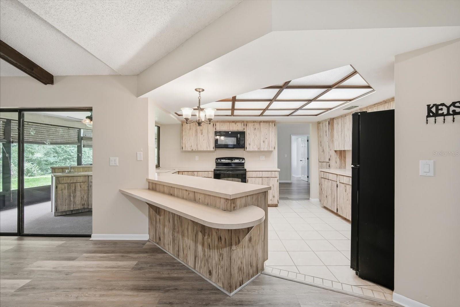 Spacious kitchen with newer appliances and ample storage