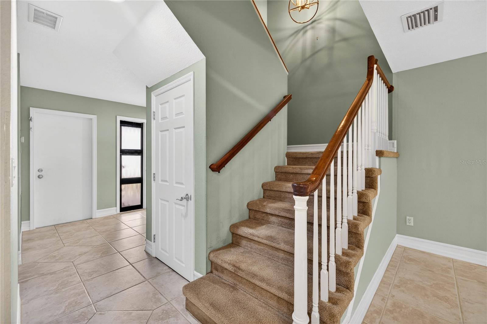 Stairs w/ upgraded wood handrails