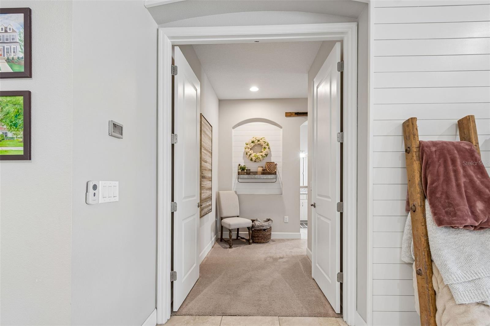 Primary Bedroom with double door entrance