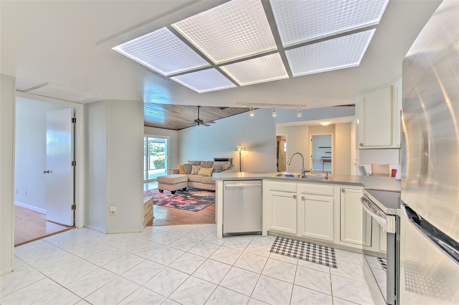 Kitchen open to living room and dining room
