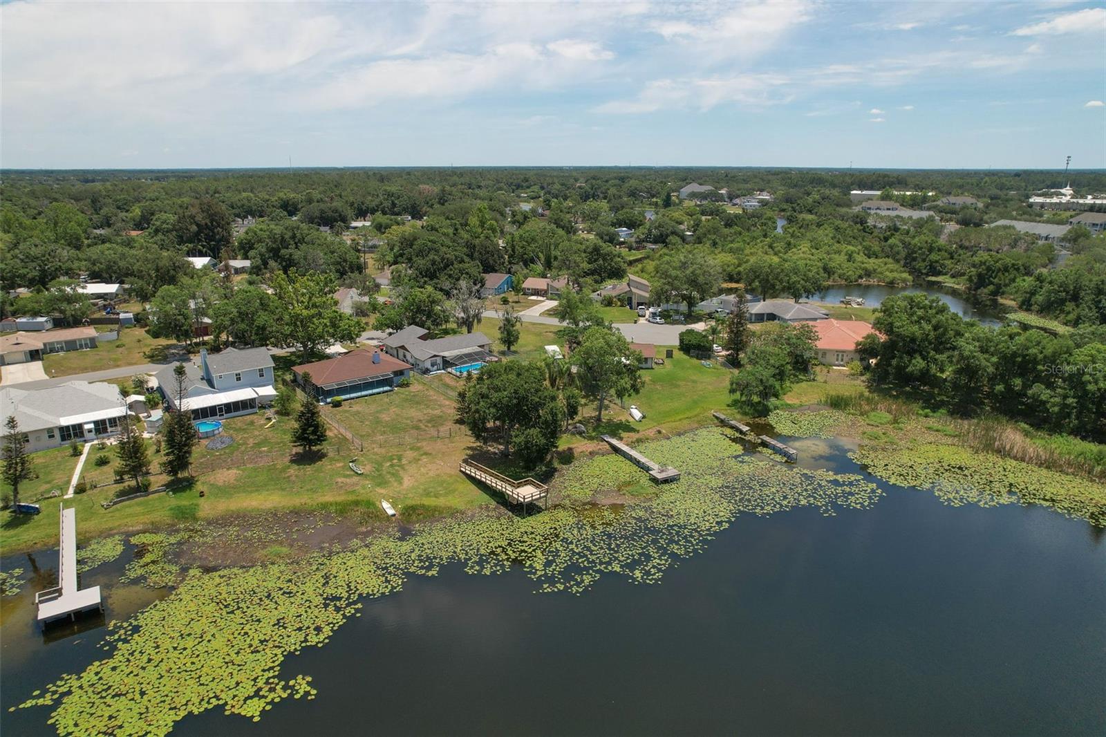 Ariel view of home from above Lake Jo Ann
