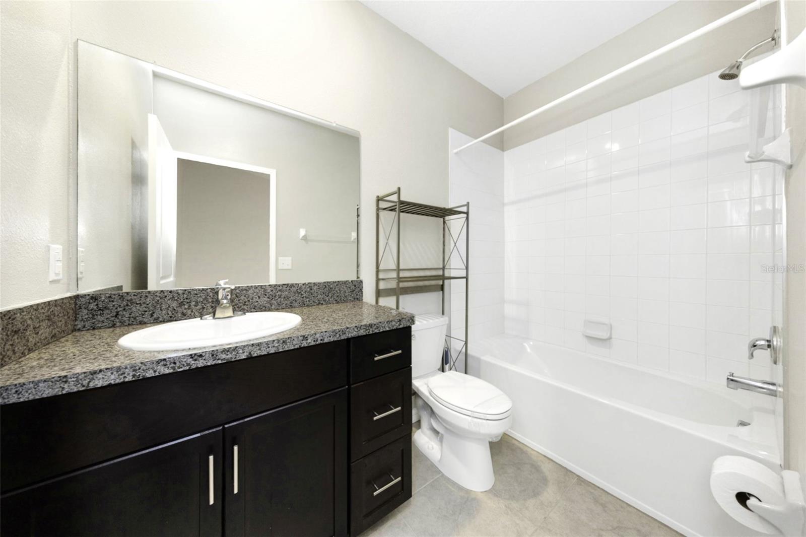 2nd bathroom upstairs with tub