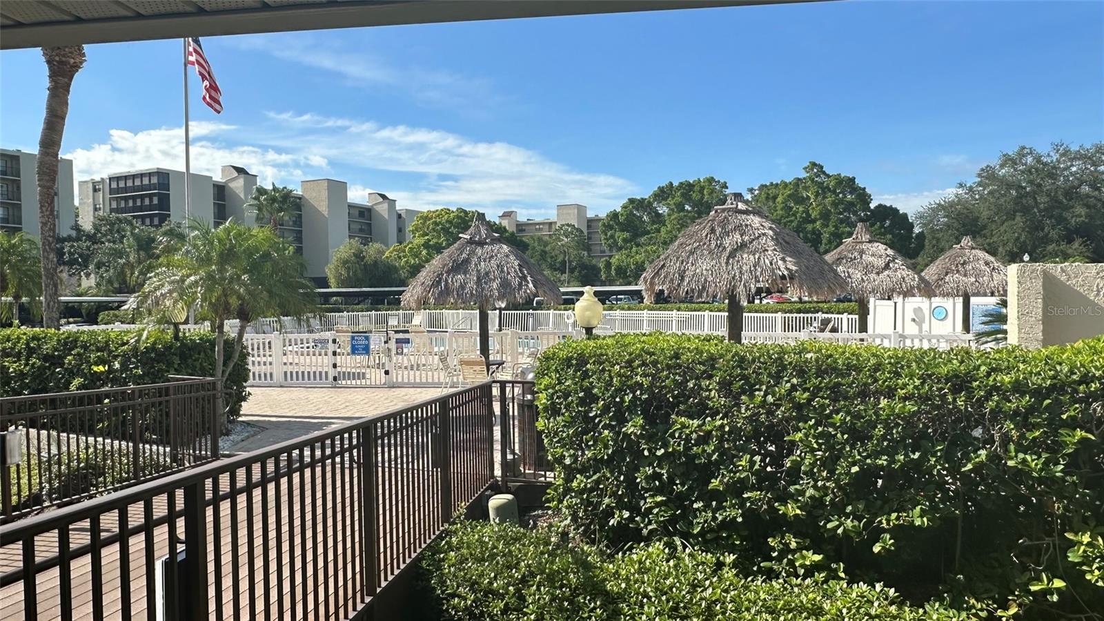Tiki Hut Gathering Area next to Swimming Pool and Clubhouse Porch.