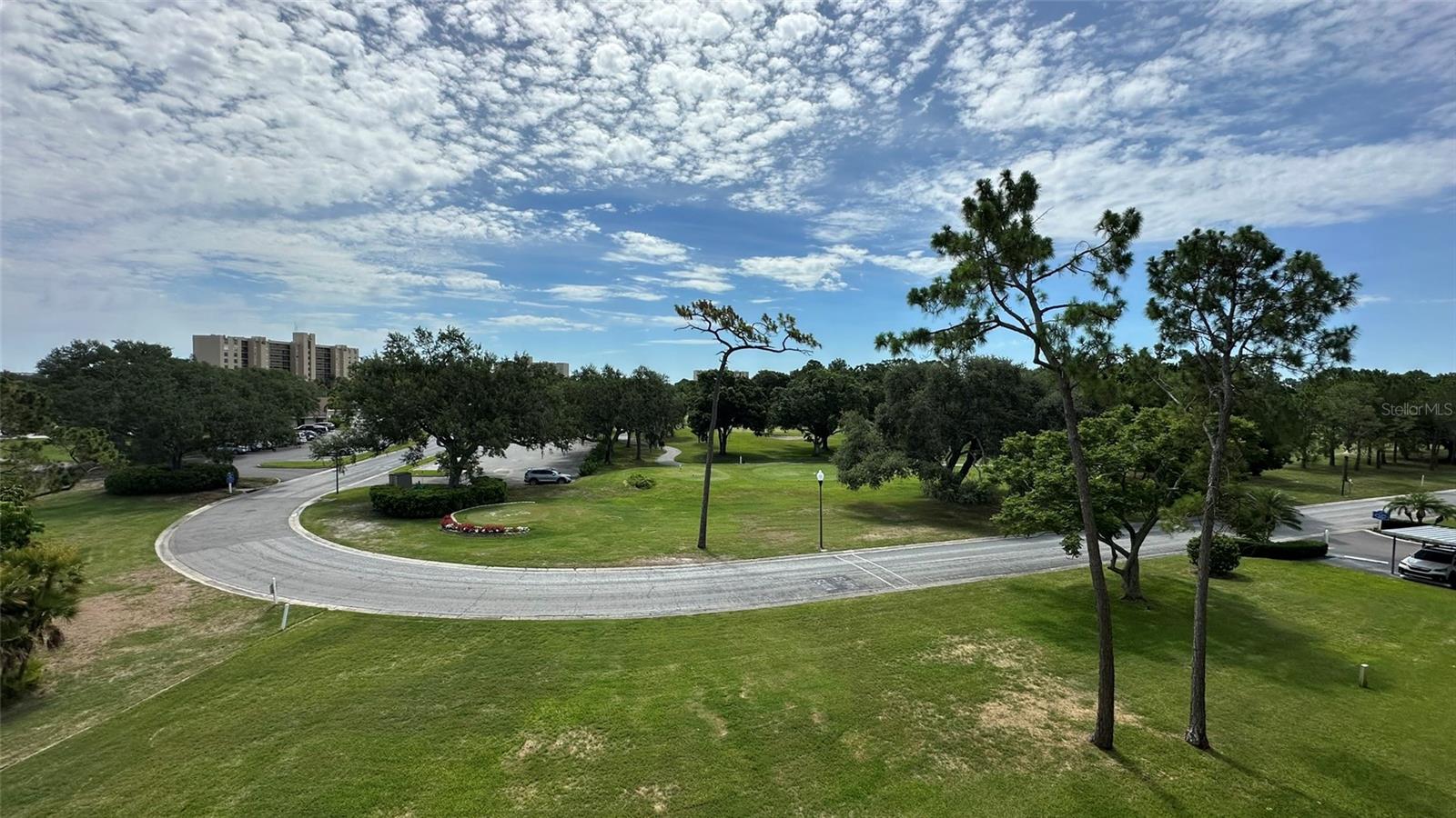 Center View from 4E Fourth Floor Porch. Tee Box, Fairway and Clubhouse/Restaurant