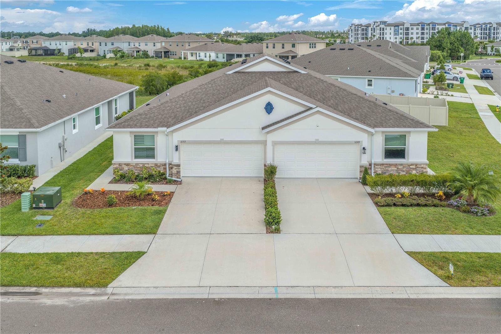 beautifully maintained 3-bedroom, 2-bath villa in the highly desirable Woodcreek community of Wesley Chapel