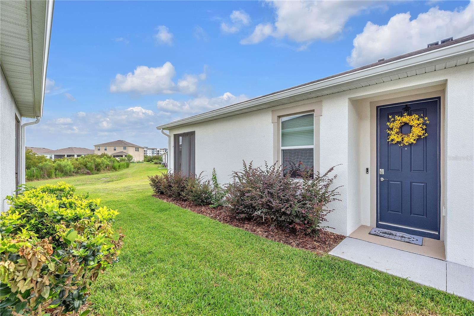 Situated on a private homesite close to the Woodcreek amenities, this home features a private entrance and screened lanai looking out over a conservation area.
