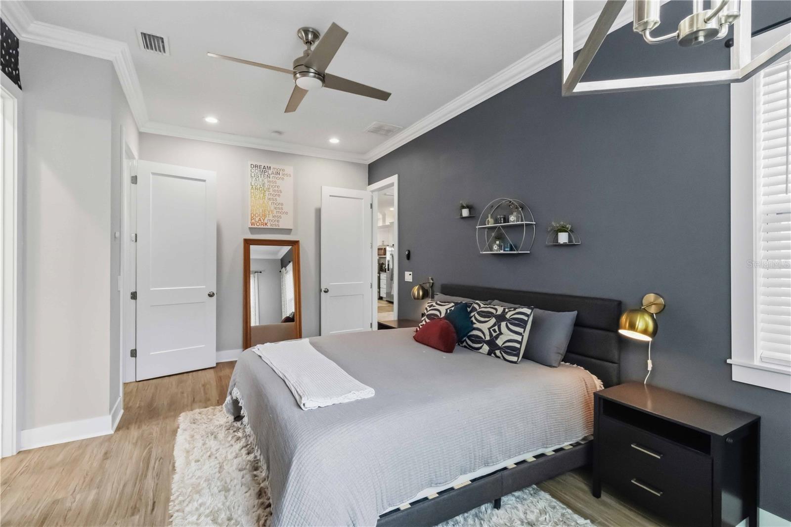 A peaceful primary bedroom with a calm, comfortable feel