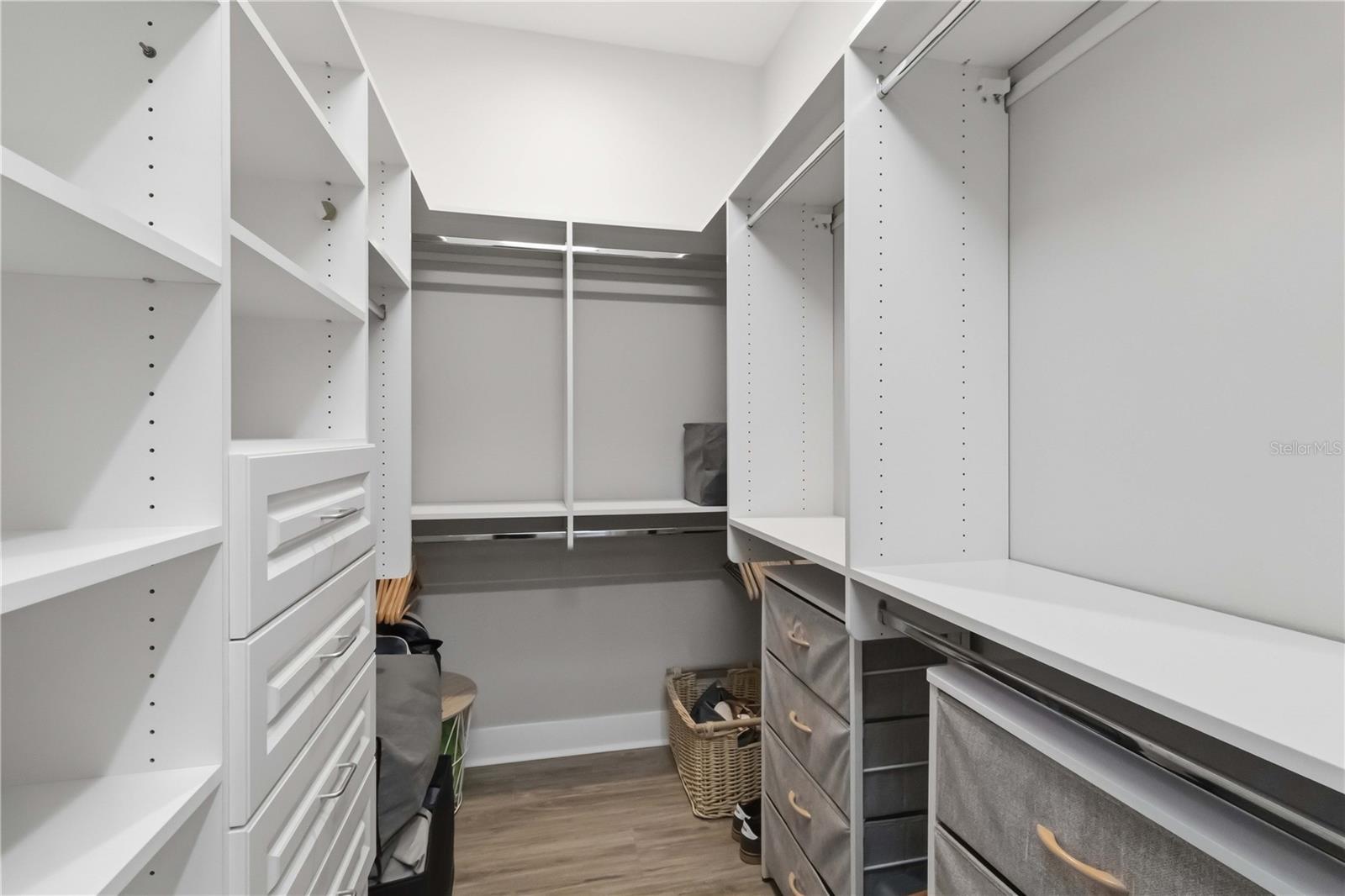 A spacious walk-in closet that keeps everything neatly within reach