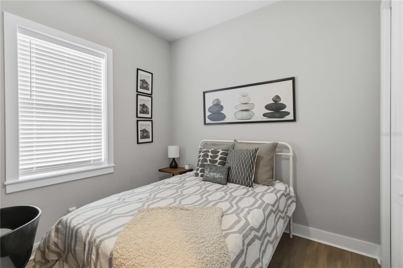 A cozy bedroom with a calm, comfortable feel