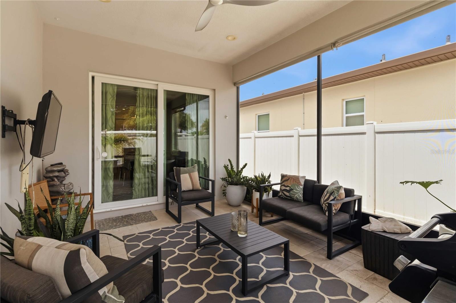 A covered outdoor retreat perfect for coffee, conversation, or quiet evenings