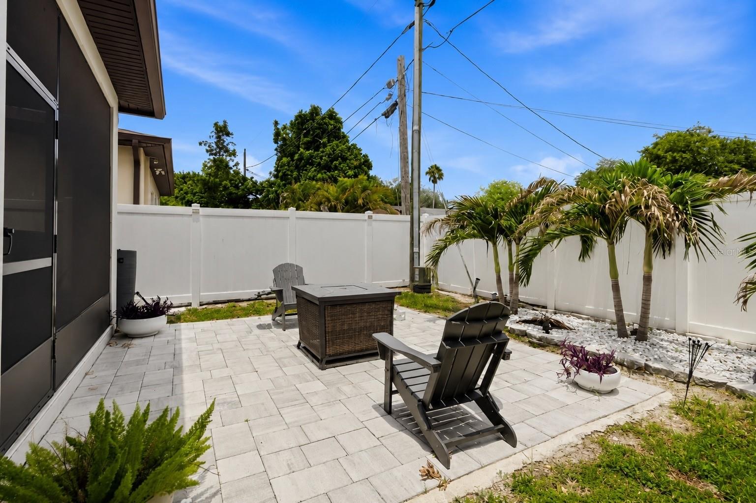 A private patio with room to dine, lounge, and enjoy the sunshine