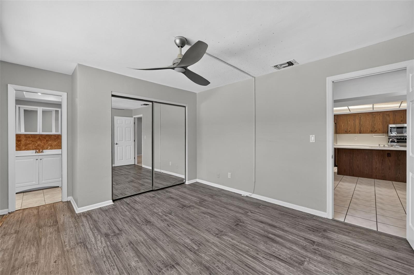 3rd Bedroom with ensuite bath and near the kitchen. Private exit to the pool .