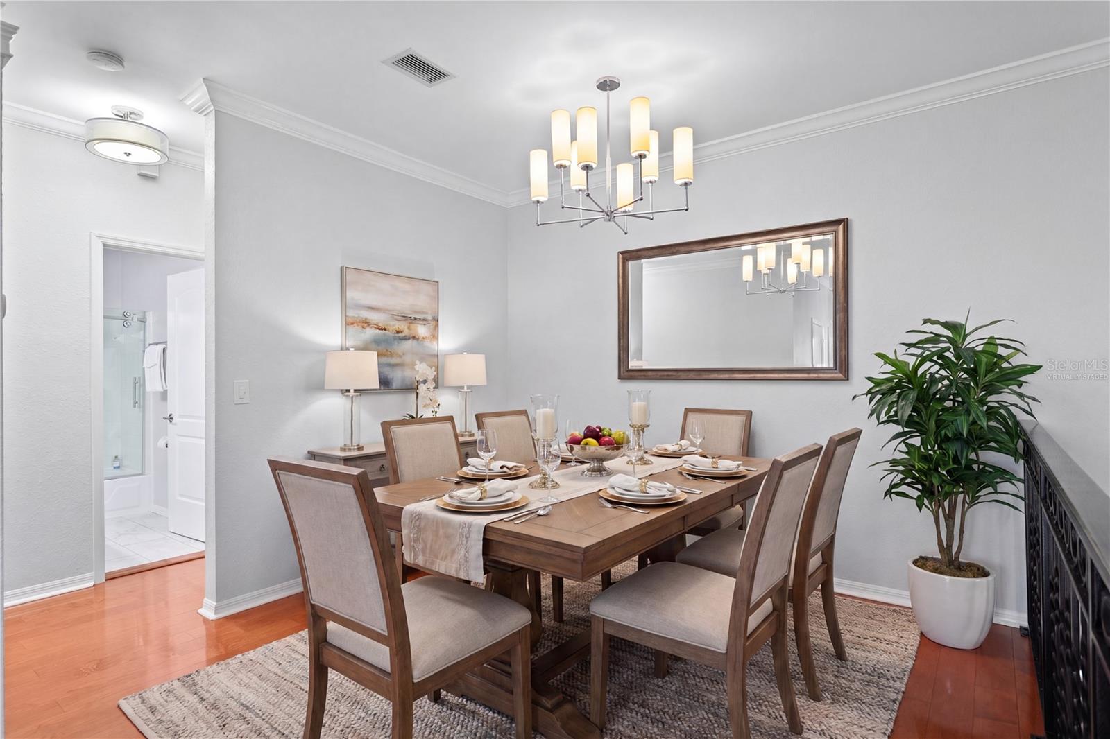 Virtually staged image - Enjoy a dedicated dining space adjacent to the kitchen for easy entertaining.
