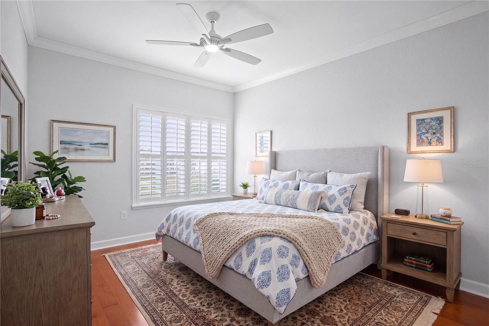 Virtually staged image - Both bedrooms include custom-built walk-in closets, fully updated baths, and are generously sized to accommodate king-size beds.