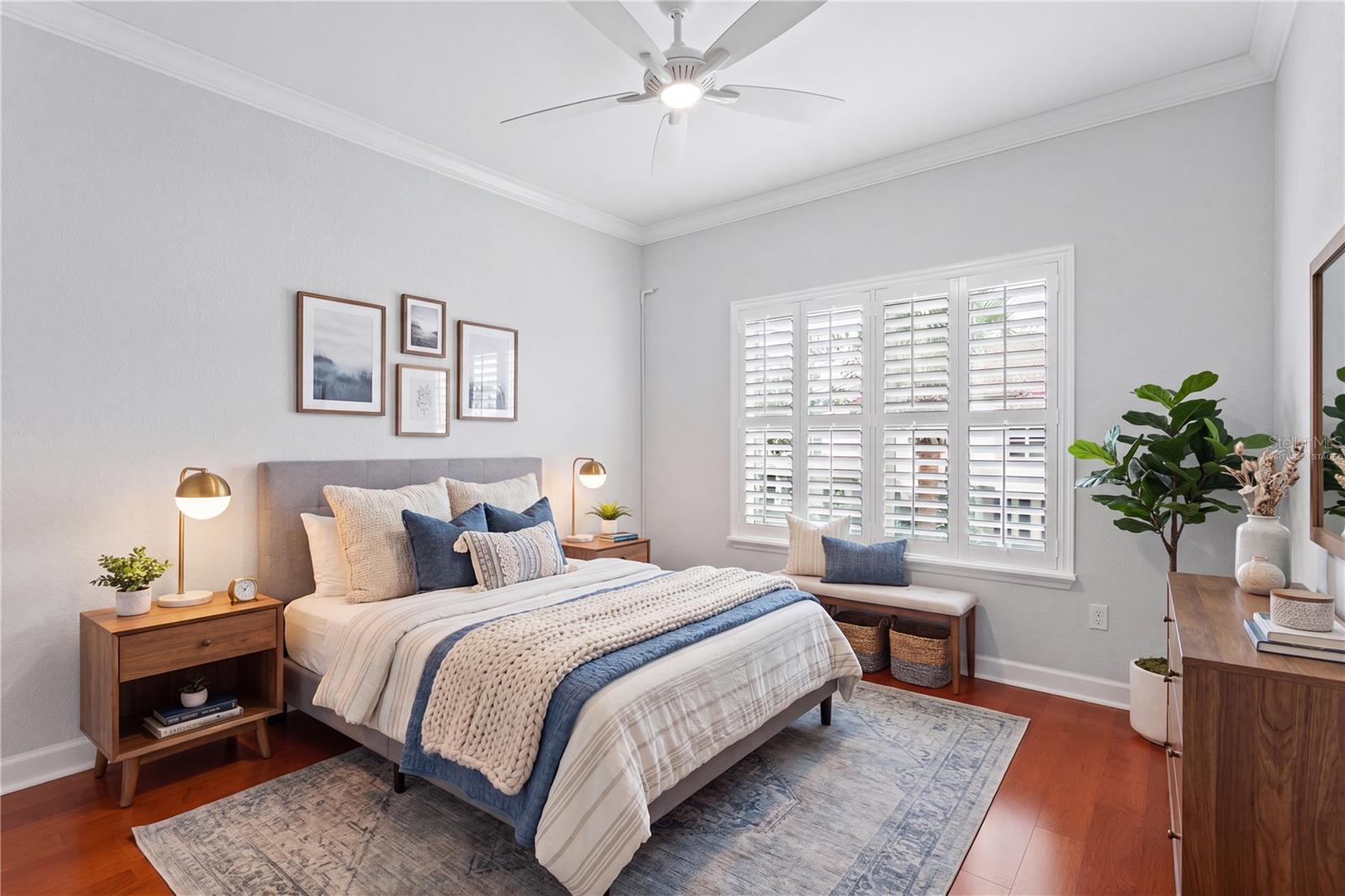 Virtually staged image - Both bedrooms include custom-built walk-in closets, fully updated baths, and are generously sized to accommodate king-size beds.