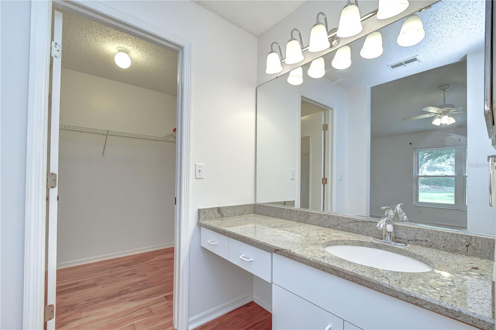 Generous walk-in closet providing ample storage.