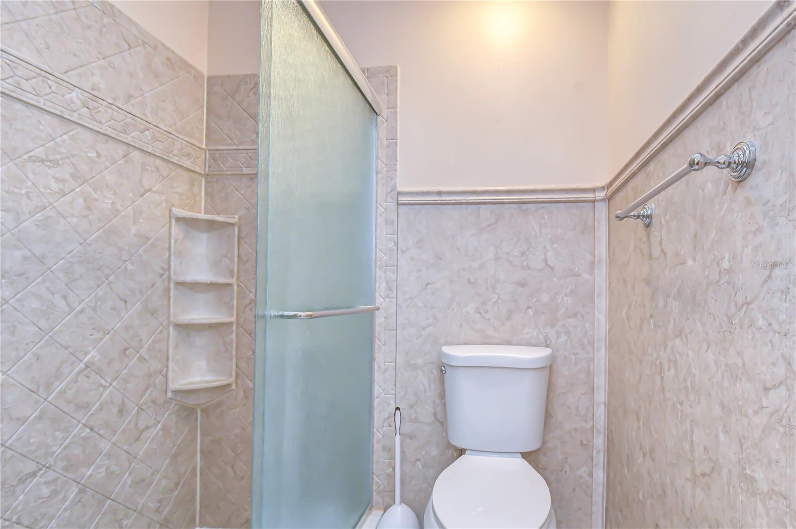 Spacious shower designed for everyday convenience.