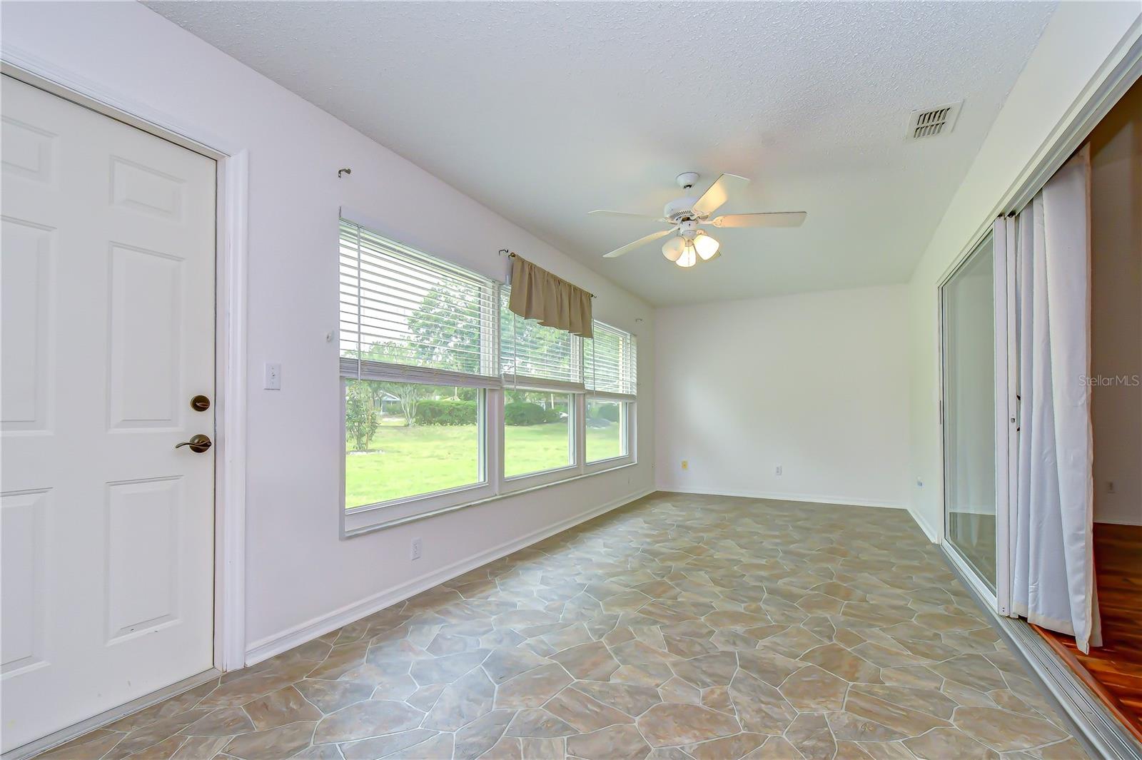 Ideal flex space for relaxing, entertaining, hobbies, or a home office.