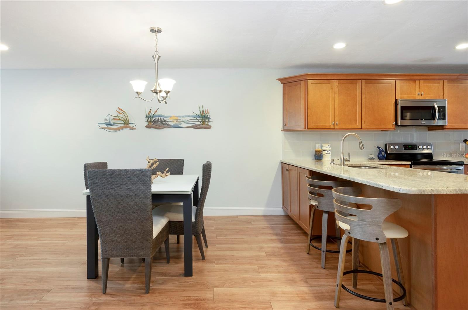 More storage! Perfect bar area overlooking the kitchen.  Large dining area, too.