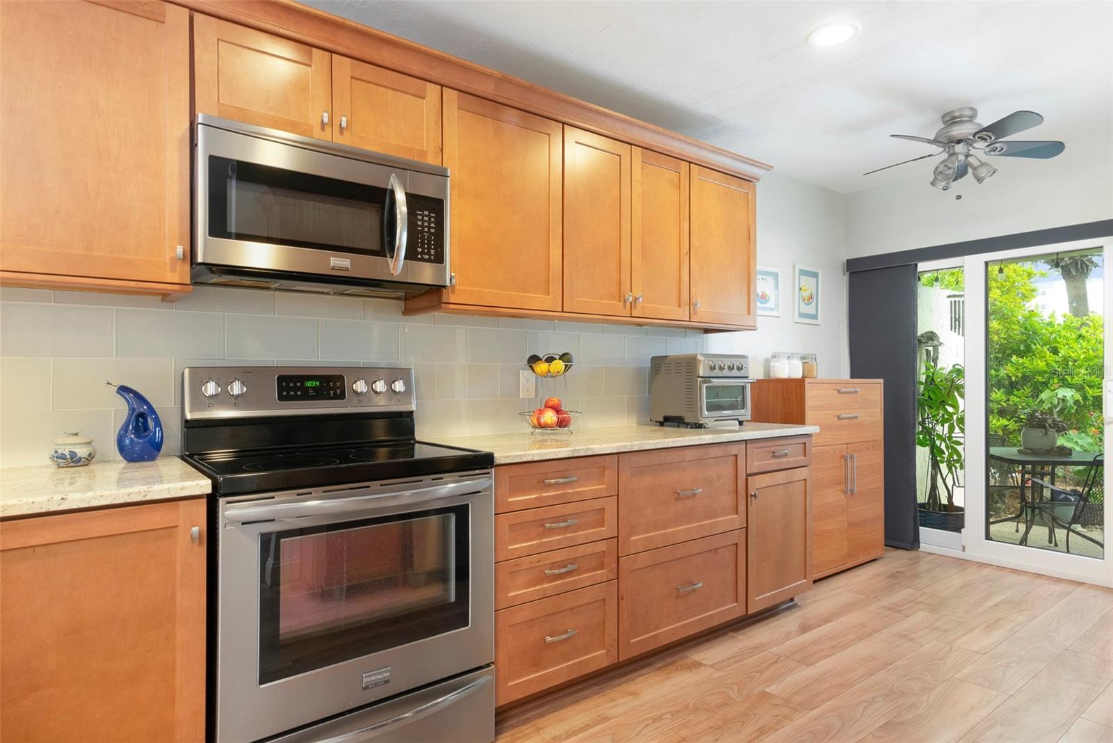 Perfect Kitchen and room to move around. Wood soft close cabinets.